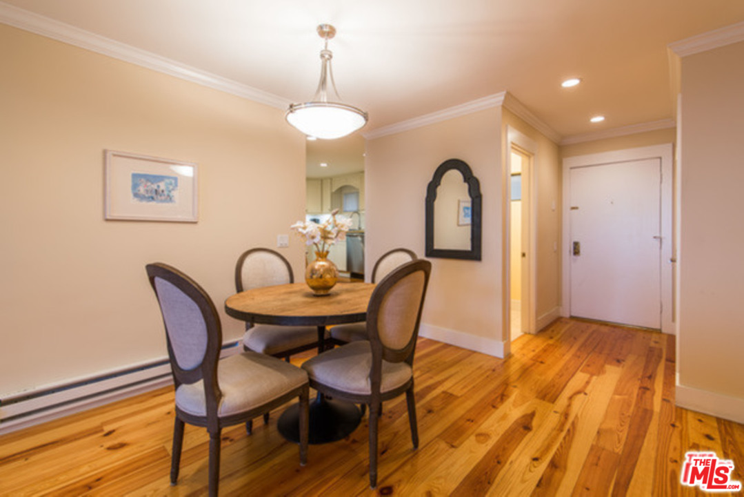 26664 Seagull Way, Unit A105 Malibu, CA 90265 - Photo 10 of 23 a view of a dining room with furniture and chandelier