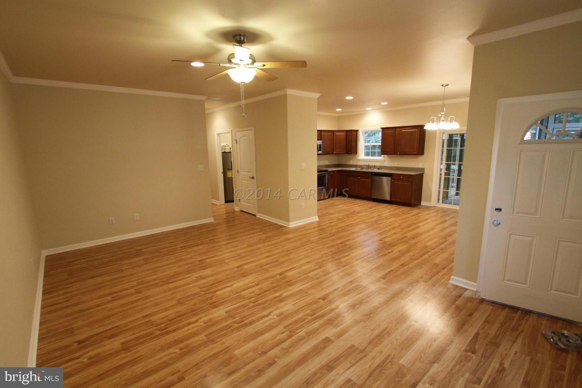 40 Capetown Road Ocean Pines, MD 21811 - Photo 5 of 23 a view of a kitchen with a sink and microwave