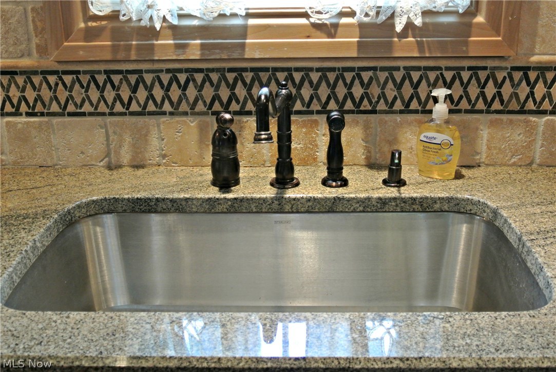 13519 Thraves Road Cleveland, OH 44125 - Photo 7 of 30 Deep, stainless steel sink