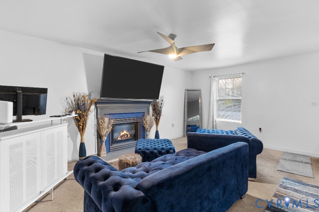4025 Frye Terrace Colonial Heights, VA 23834 - Photo 5 of 14 Living area featuring a central fireplace with a d