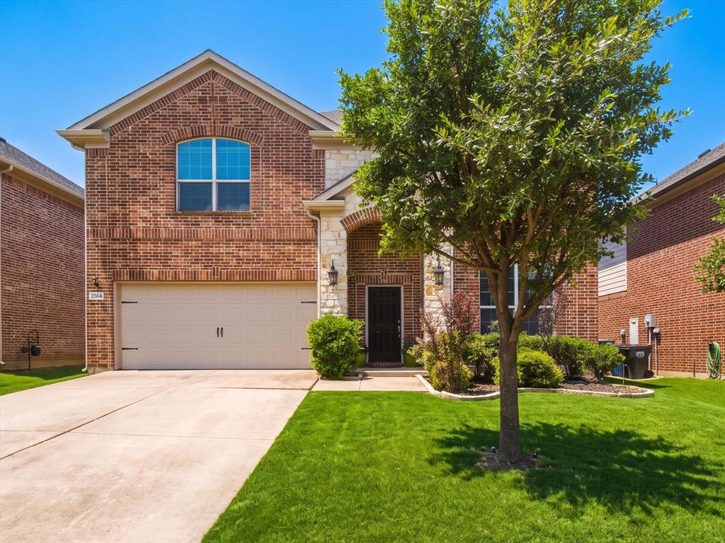 2364 Ranchview Drive Little Elm, TX 75068 - Photo 1 of 33 Brick and stone facade, Front facing garage