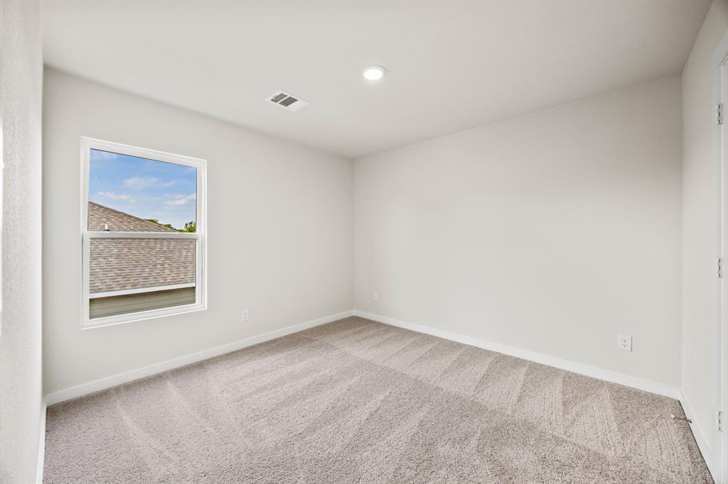 1017 Verde Creek Crowley, TX 76036 - Photo 12 of 20 an empty room with windows