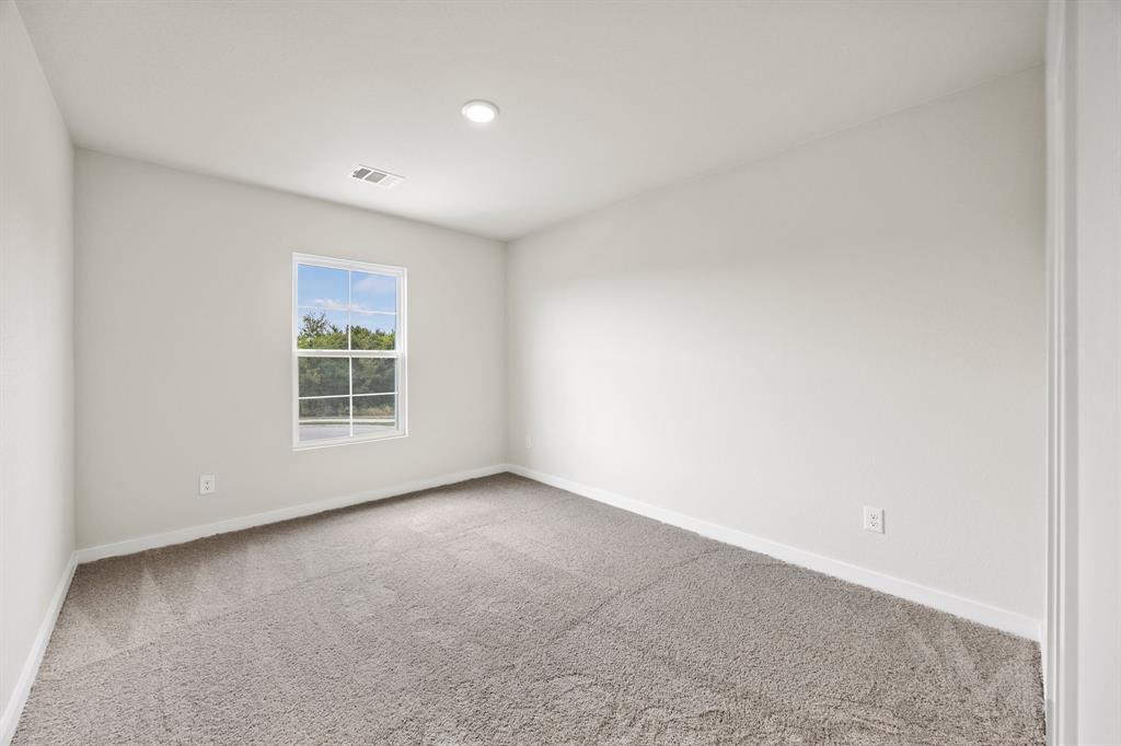1017 Verde Creek Crowley, TX 76036 - Photo 14 of 20 an empty room with windows