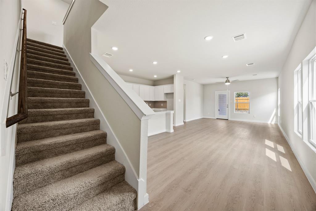1017 Verde Creek Crowley, TX 76036 - Photo 3 of 20 a view of entryway and hall with wooden floor