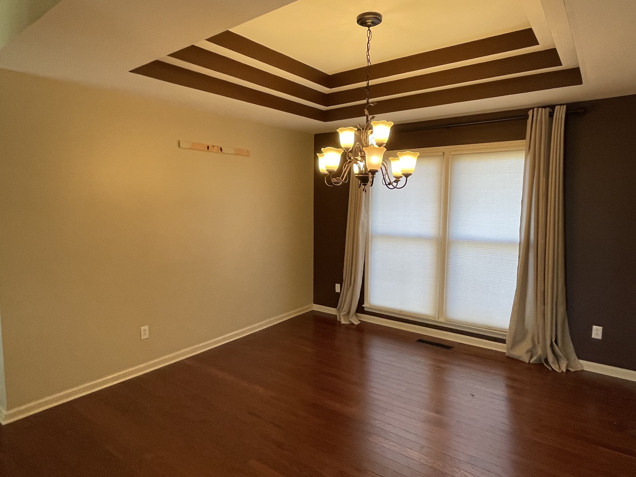 514 Lakeside Drive Springfield, TN 37172 - Photo 19 of 36 an empty room with wooden floor and windows