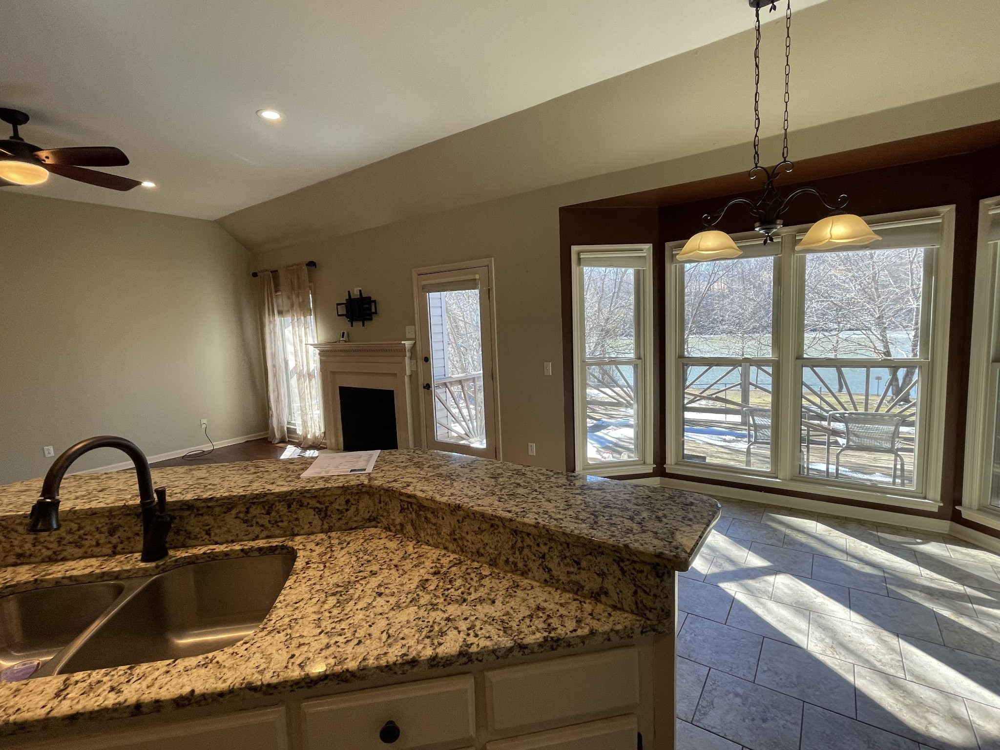 514 Lakeside Drive Springfield, TN 37172 - Photo 23 of 36 a kitchen with a granite countertop sink and stove