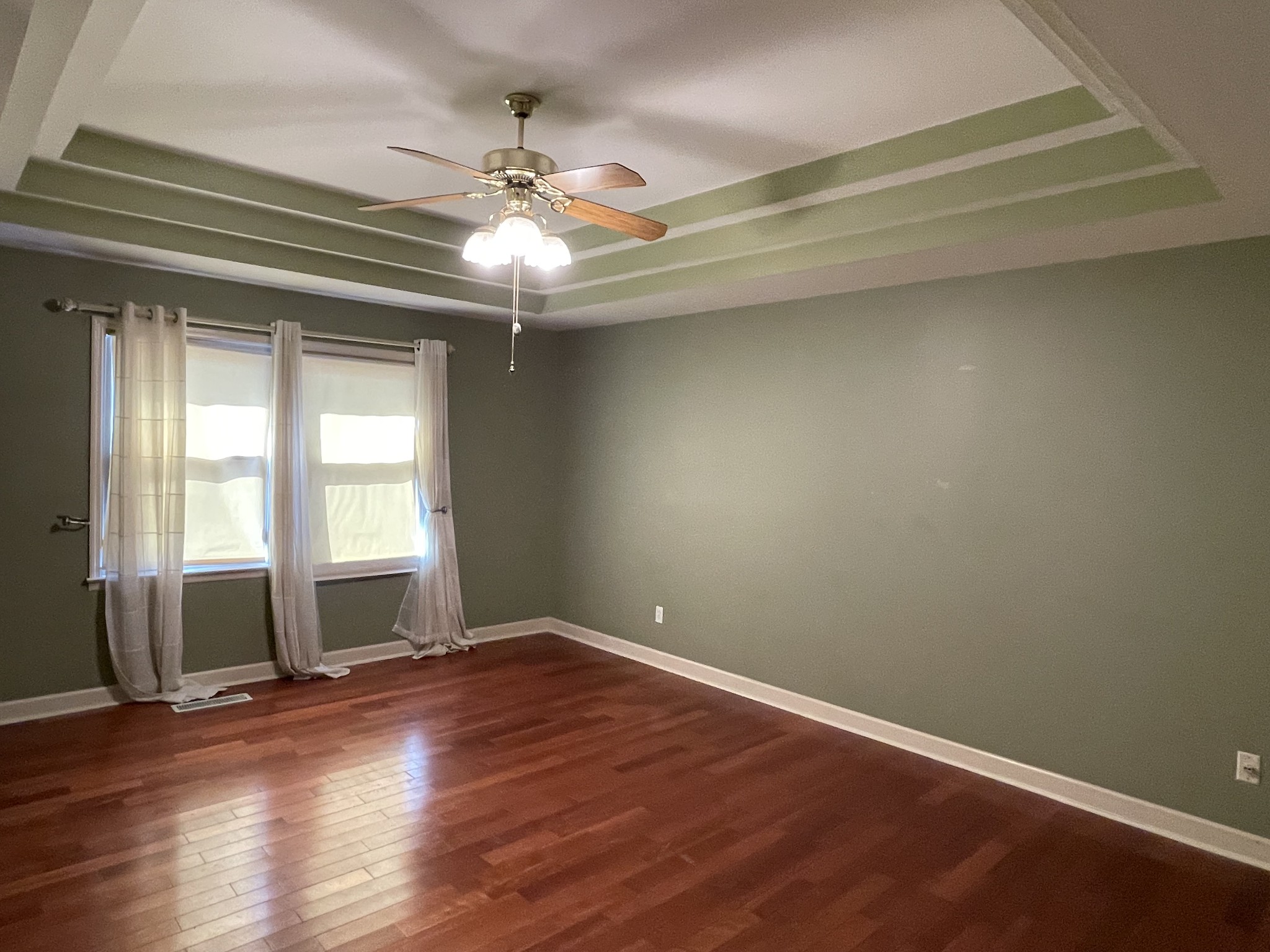 514 Lakeside Drive Springfield, TN 37172 - Photo 25 of 36 a view of an empty room with wooden floor and a window