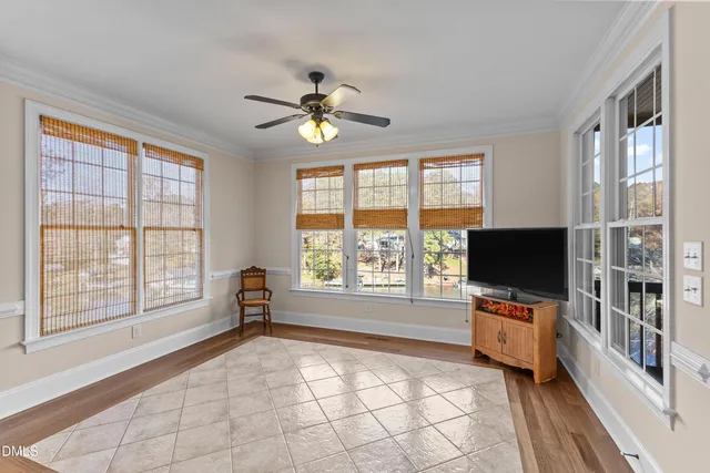 a front view of a house with a big yard