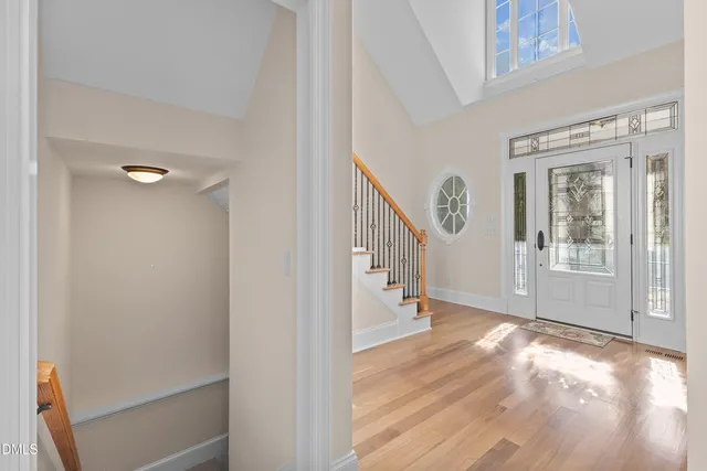 a kitchen with stainless steel appliances granite countertop a stove and a refrigerator