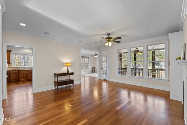 a kitchen with granite countertop a stove and cabinets