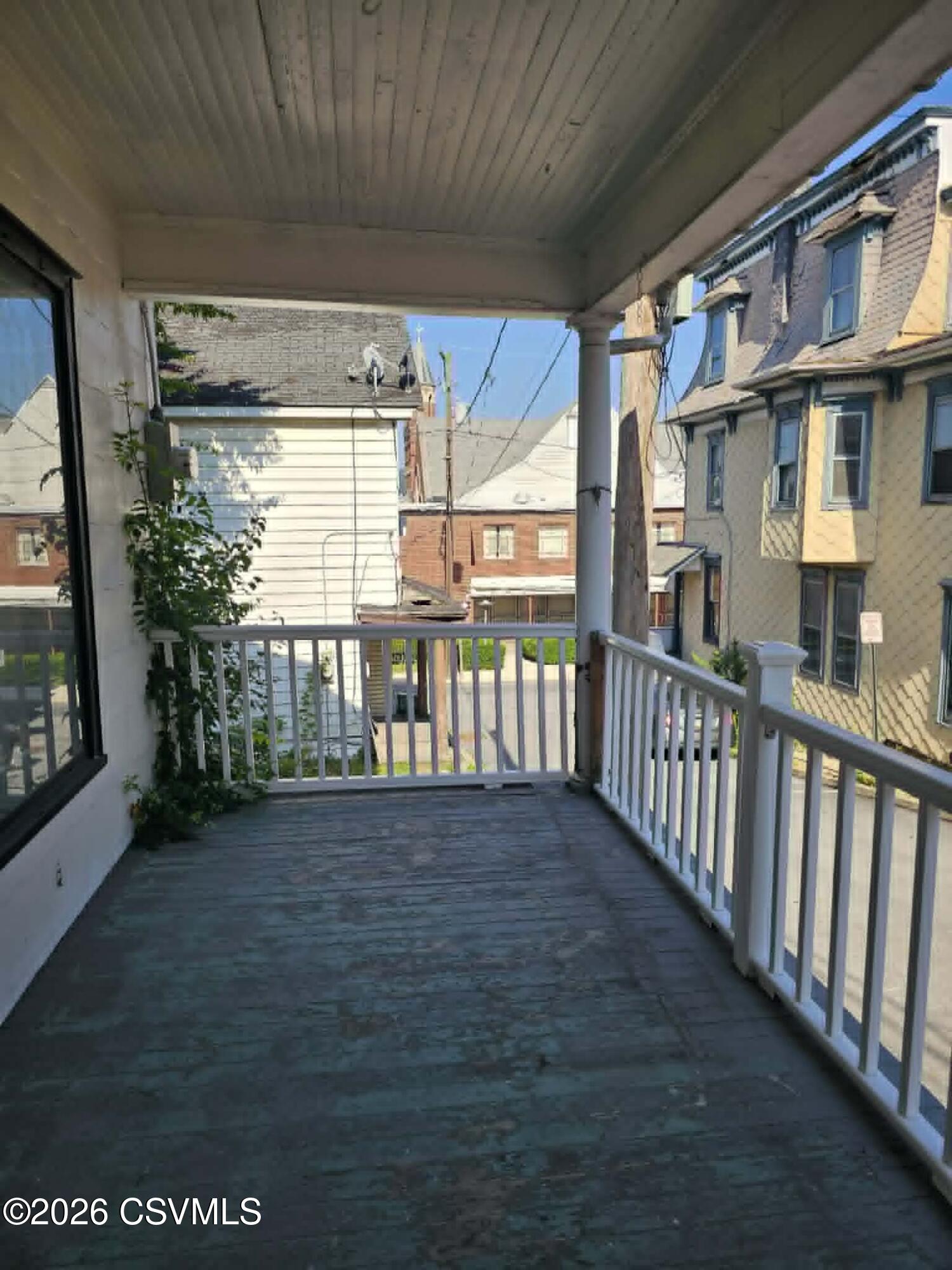 110 Birch Street Shamokin, PA 17872 - Photo 3 of 19 a view of a porch with wooden floor and outdoor space