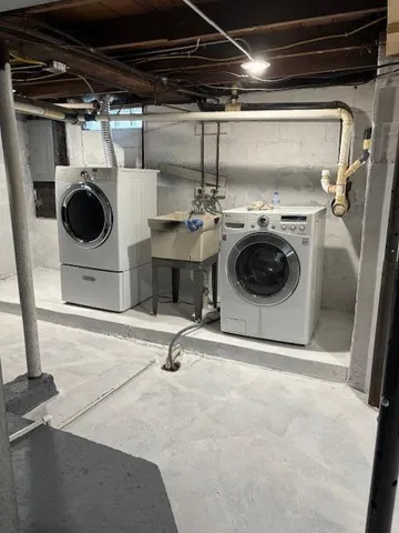 a utility room with dryer and washer