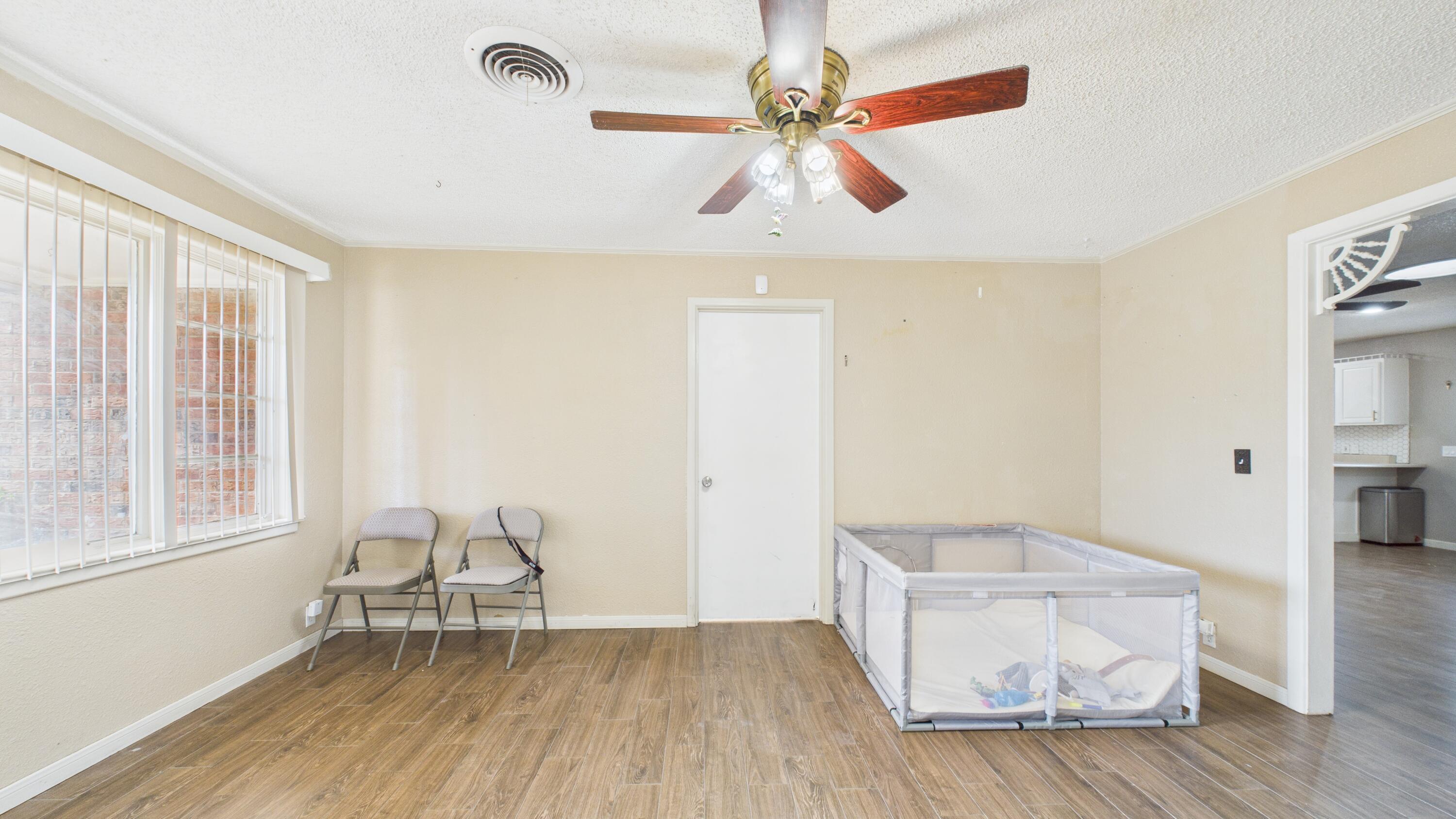5410 41st Street Lubbock, TX 79414 - Photo 12 of 40 a living room with furniture and a window