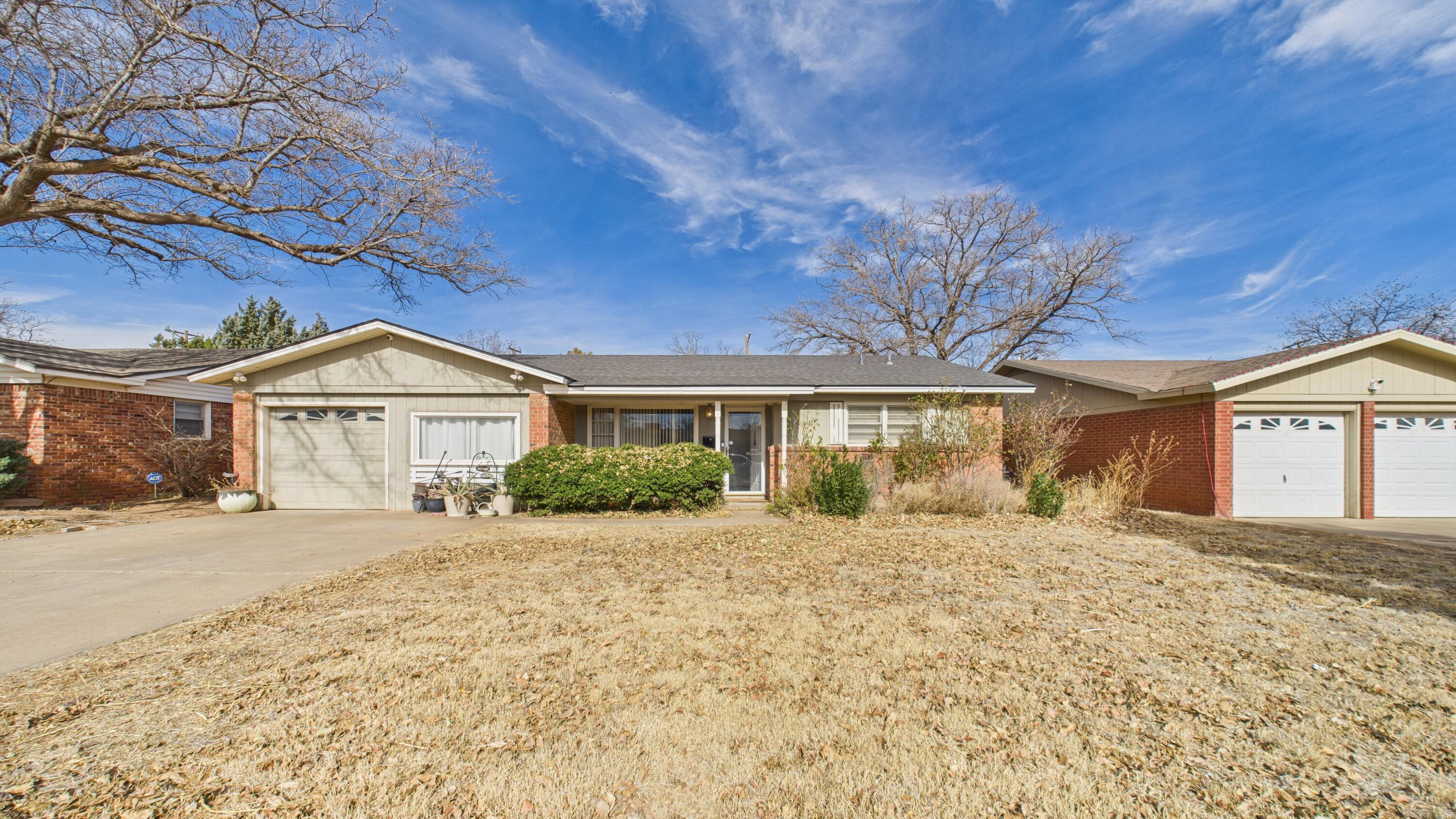 5410 41st Street Lubbock, TX 79414 - Photo 2 of 40 a view of house with yard