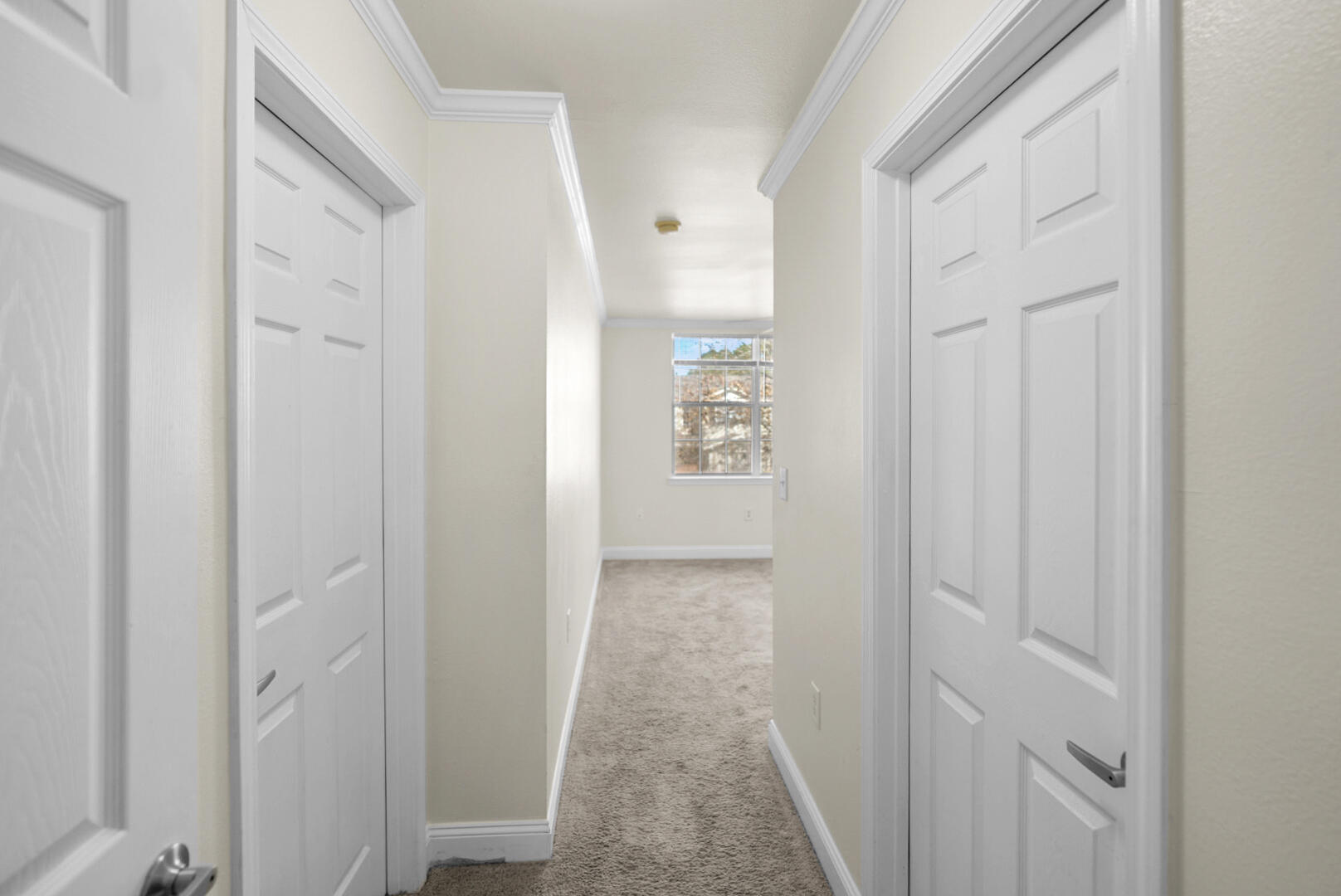 506 Wingspan Way Crestview, FL 32536 - Photo 18 of 33 a view of a hallway with white walls and closet