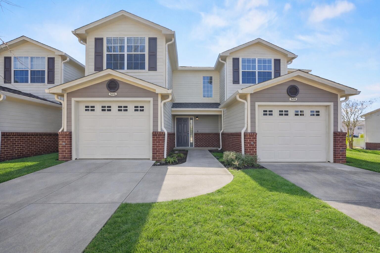 506 Wingspan Way Crestview, FL 32536 - Photo 28 of 33 a front view of a house with a yard and garage