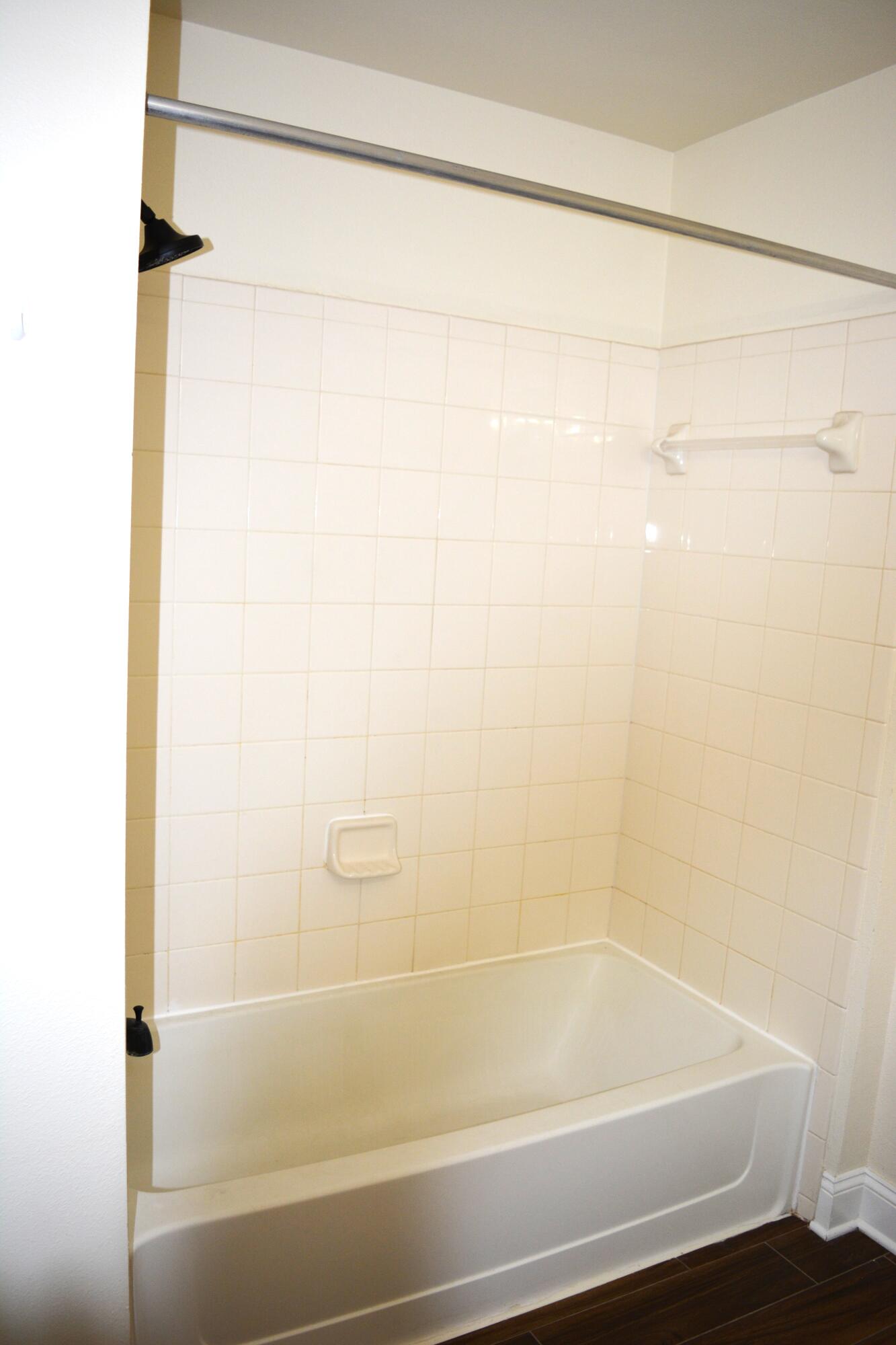 506 Wingspan Way Crestview, FL 32536 - Photo 31 of 38 a bathroom with a bathtub and shower