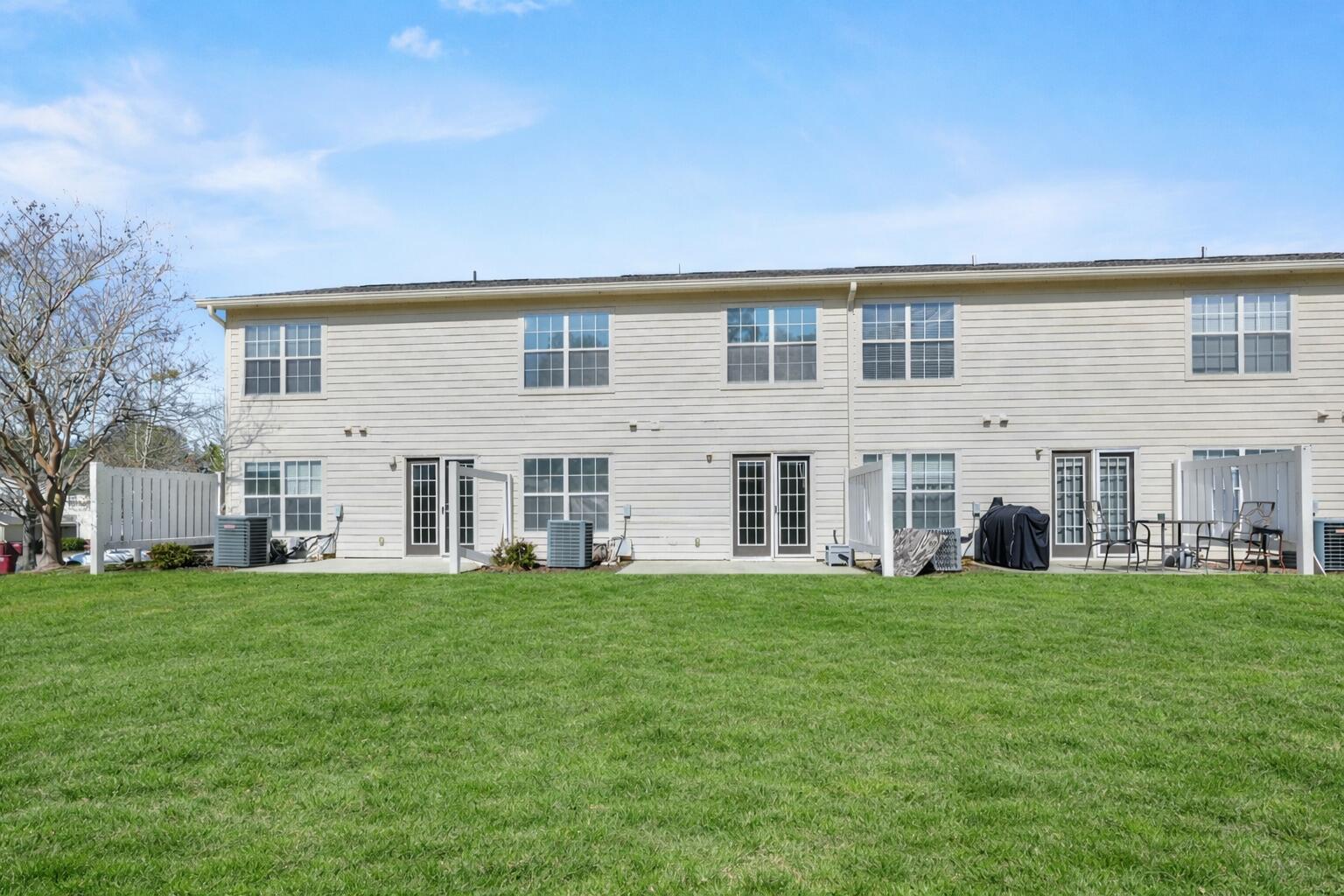 506 Wingspan Way Crestview, FL 32536 - Photo 32 of 33 a big house with a big yard and large trees