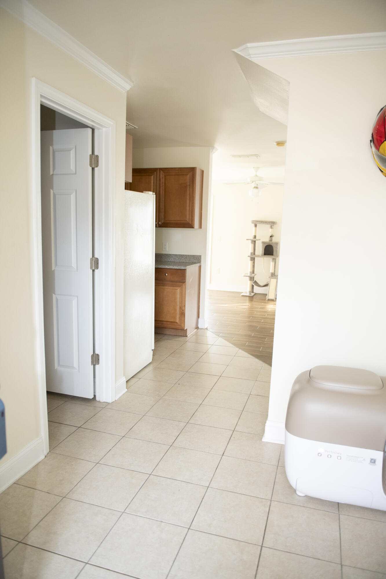 506 Wingspan Way Crestview, FL 32536 - Photo 4 of 38 a view of kitchen with furniture and refrigerator