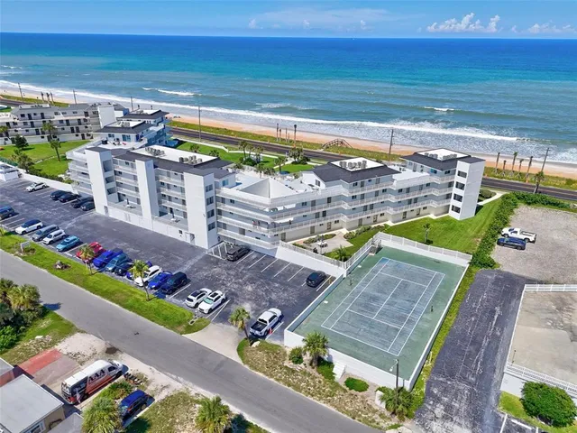 a view of a city with an ocean view