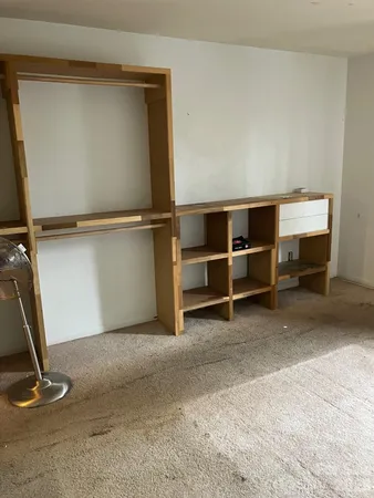 a view of a room with shelves