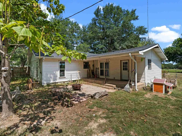 a house with garden in front of it