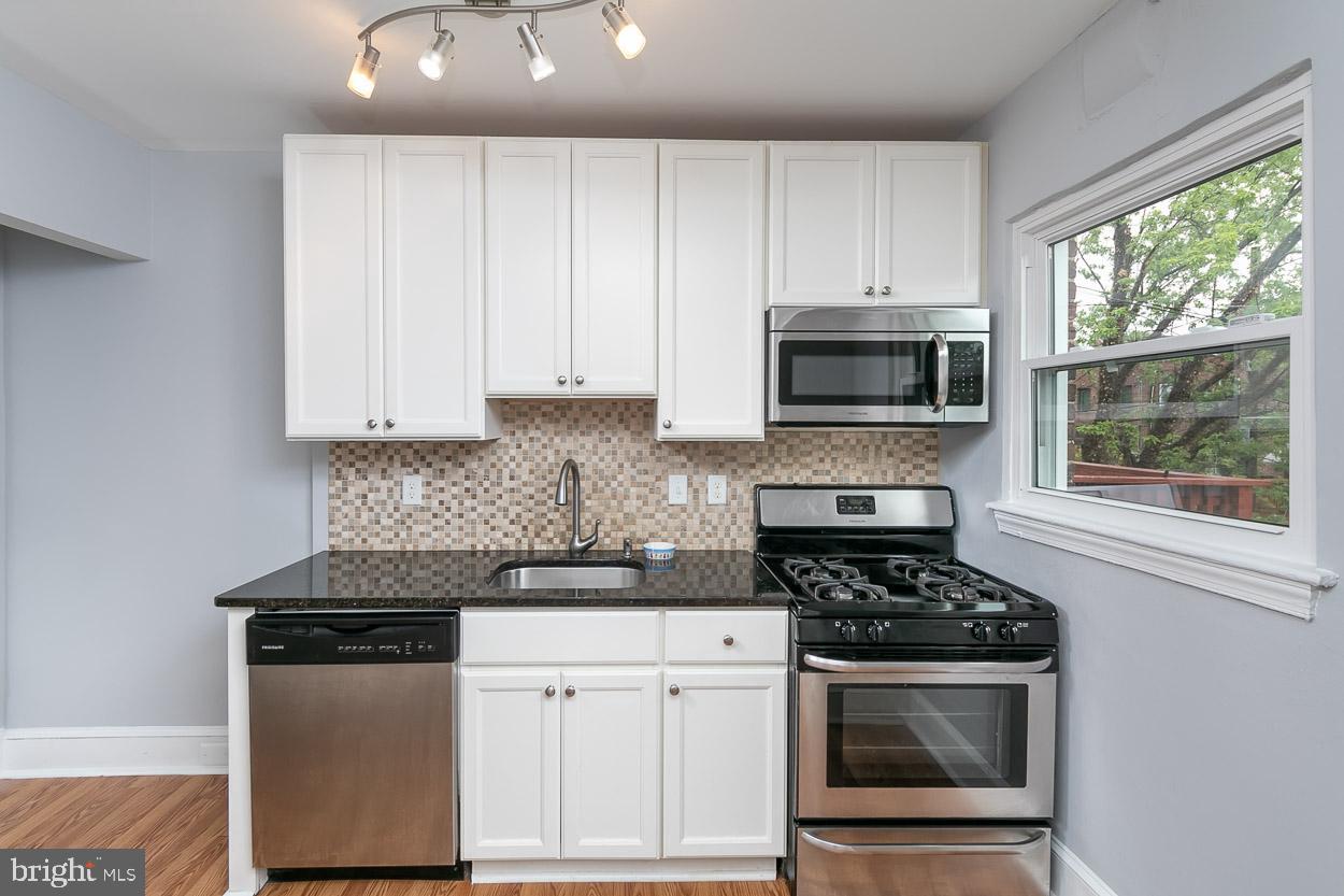 3703 Elkader Road Baltimore, MD 21218 - Photo 7 of 34 Recently updated kitchen with SS appliances