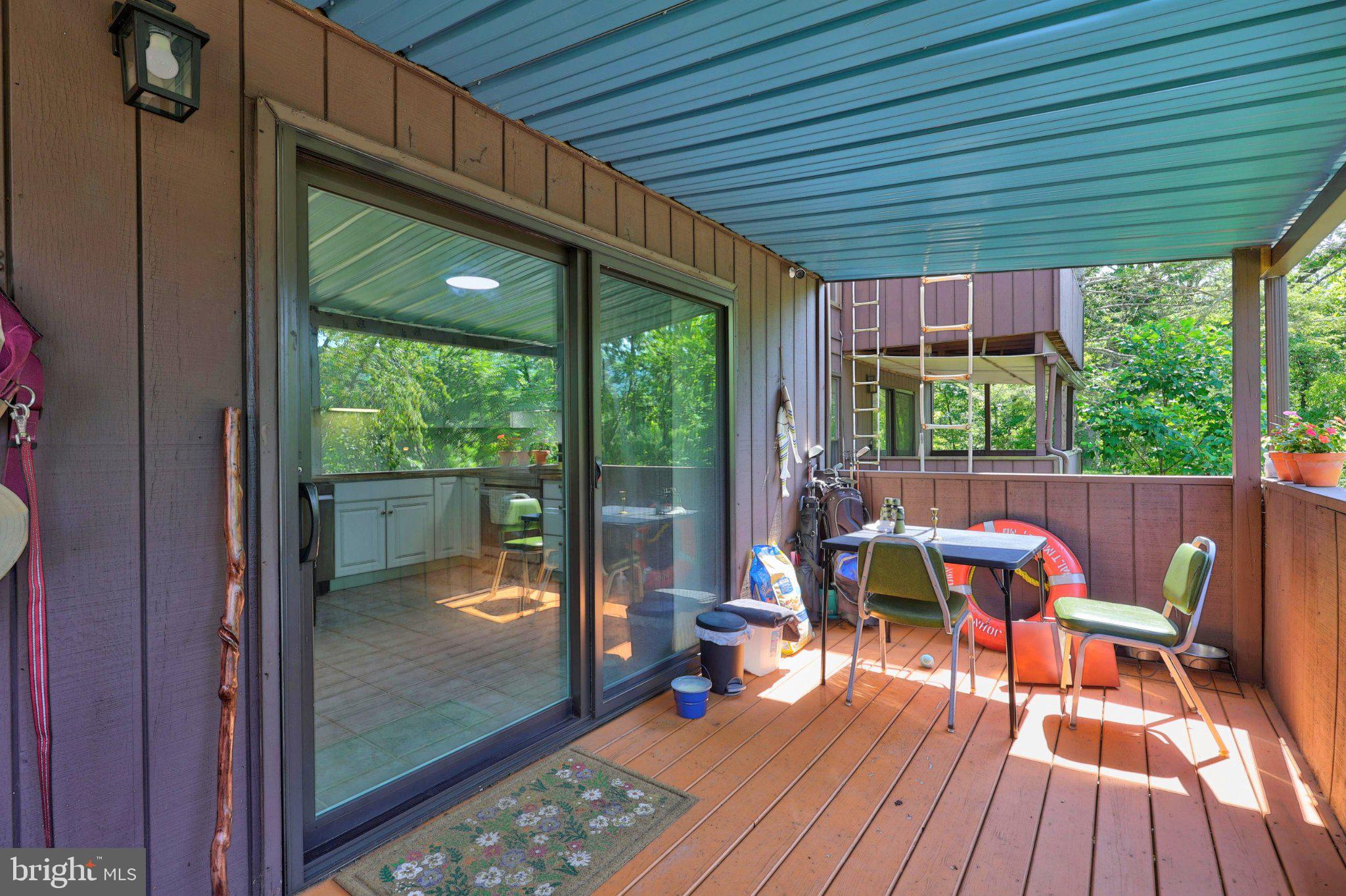 274 The Hill Road, Unit 13A Basye, VA 22810 - Photo 10 of 12 Serene outdoor retreat with lush views.