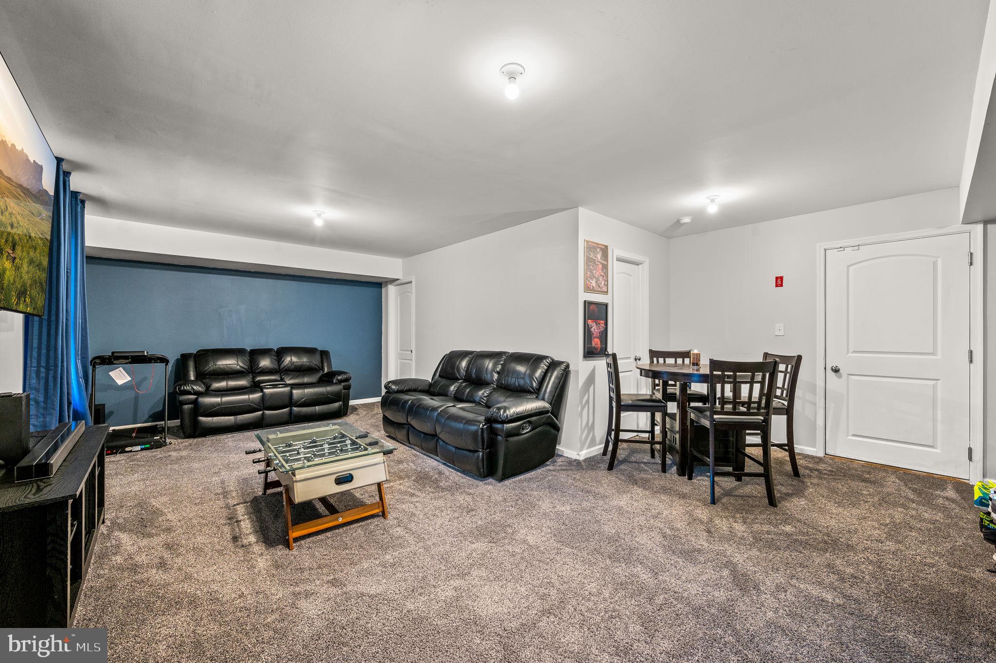131 Time Circle Bear, DE 19701 - Photo 19 of 35 a living room with furniture a table and chairs