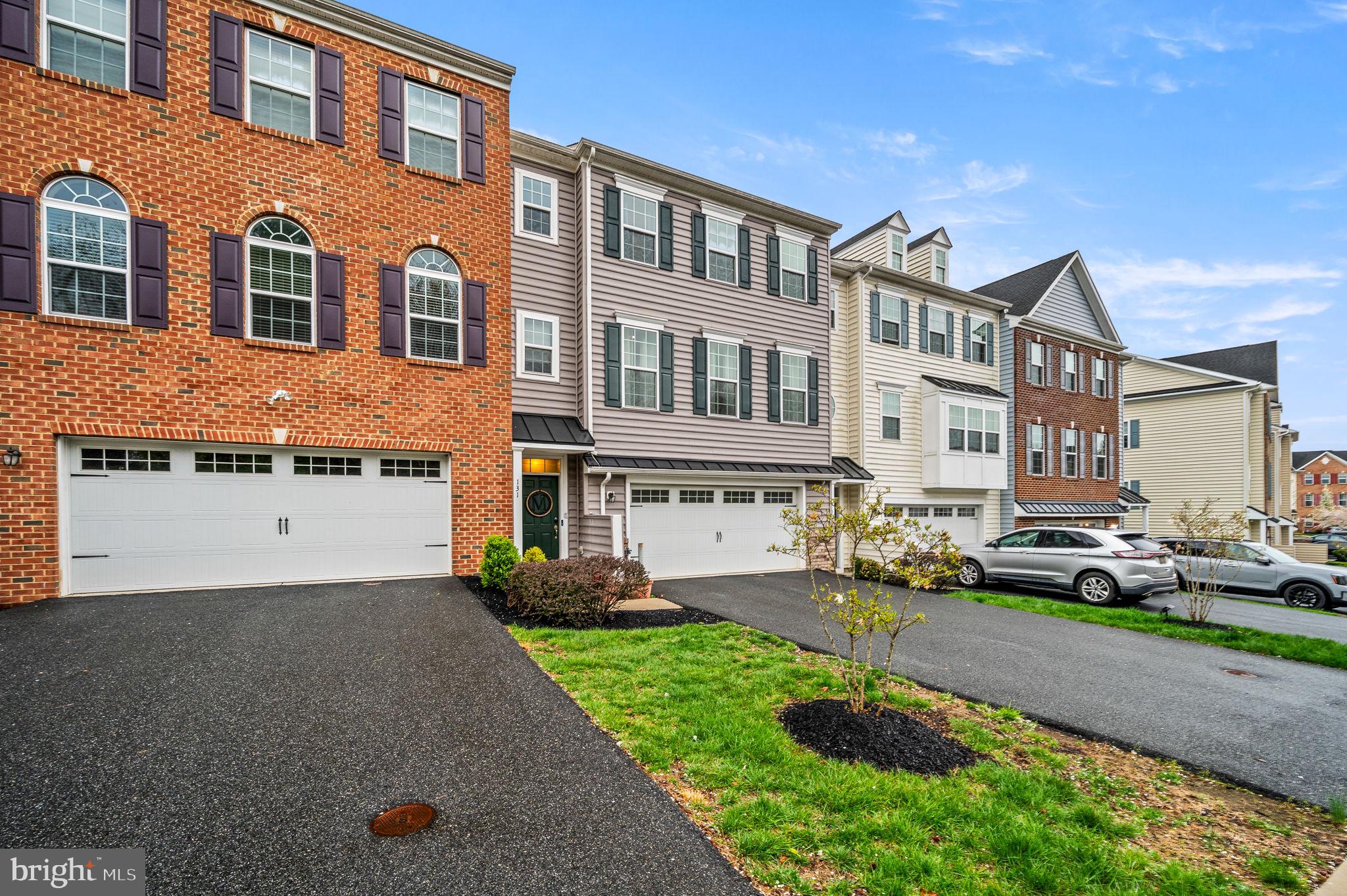 131 Time Circle Bear, DE 19701 - Photo 2 of 35 a front view of a house with garden