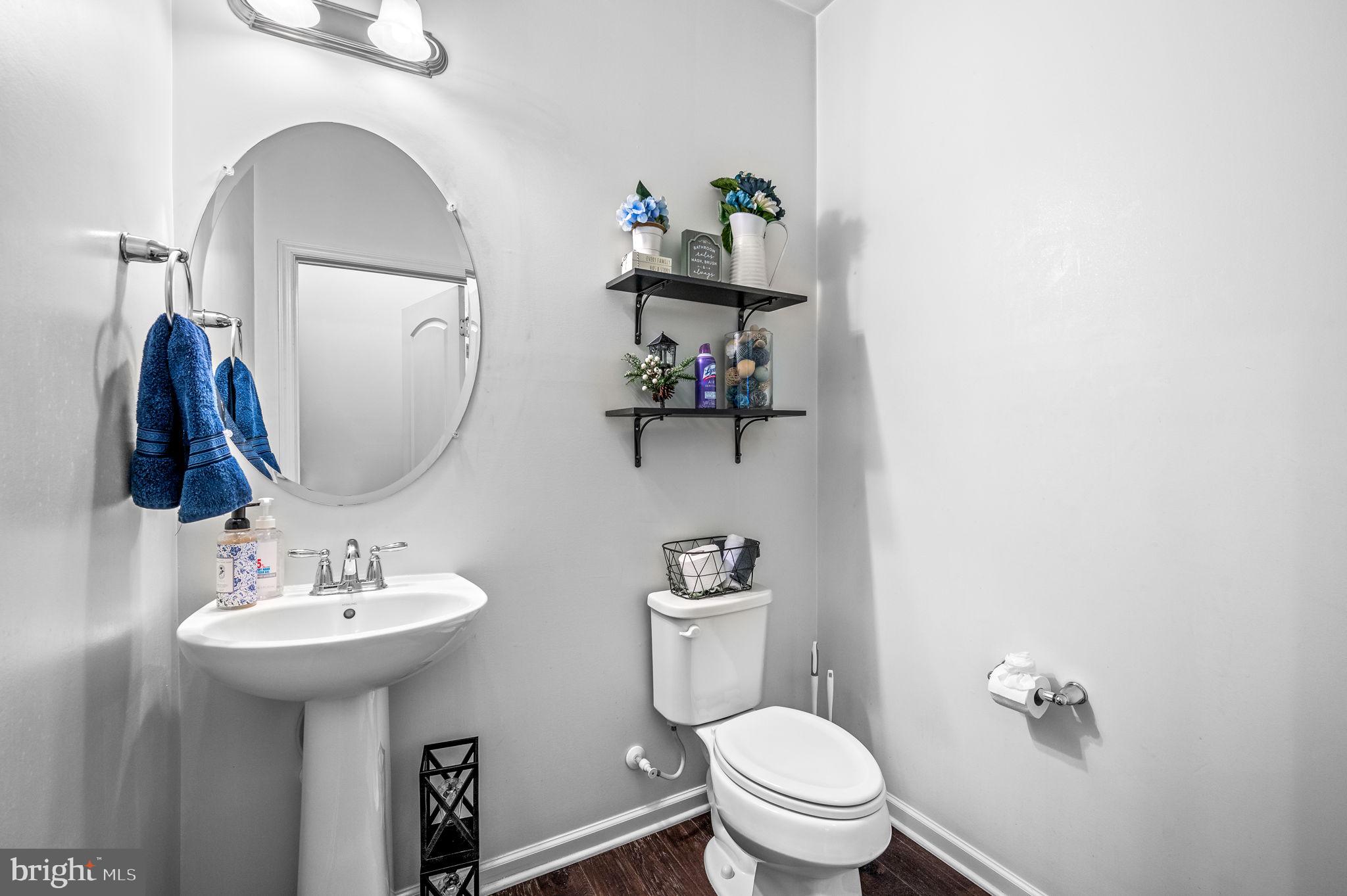 131 Time Circle Bear, DE 19701 - Photo 23 of 35 a bathroom with a sink mirror and toilet