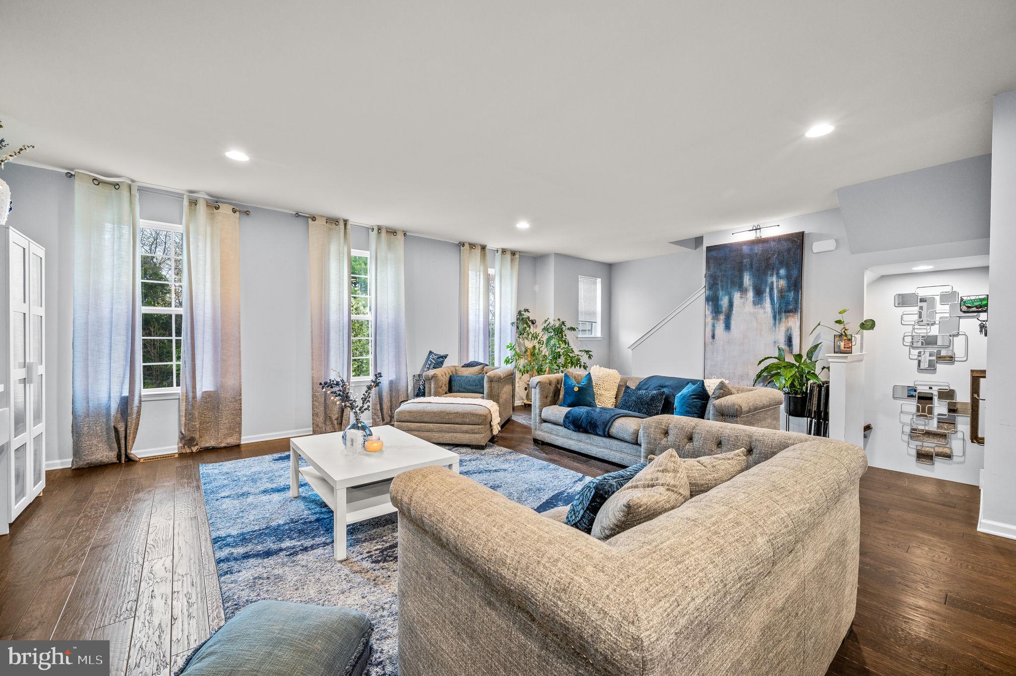 131 Time Circle Bear, DE 19701 - Photo 24 of 35 a living room with furniture and wooden floor