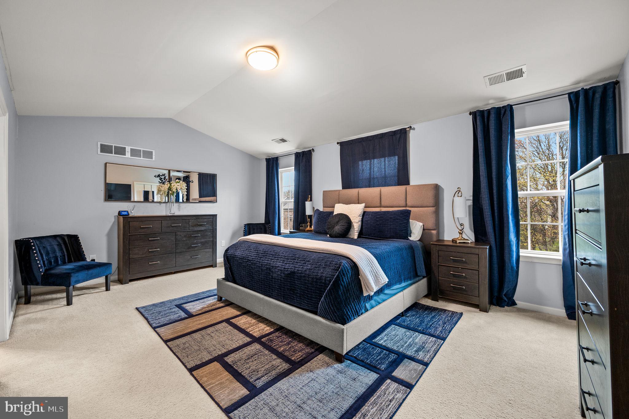 131 Time Circle Bear, DE 19701 - Photo 25 of 35 a bedroom with a large bed and a couch