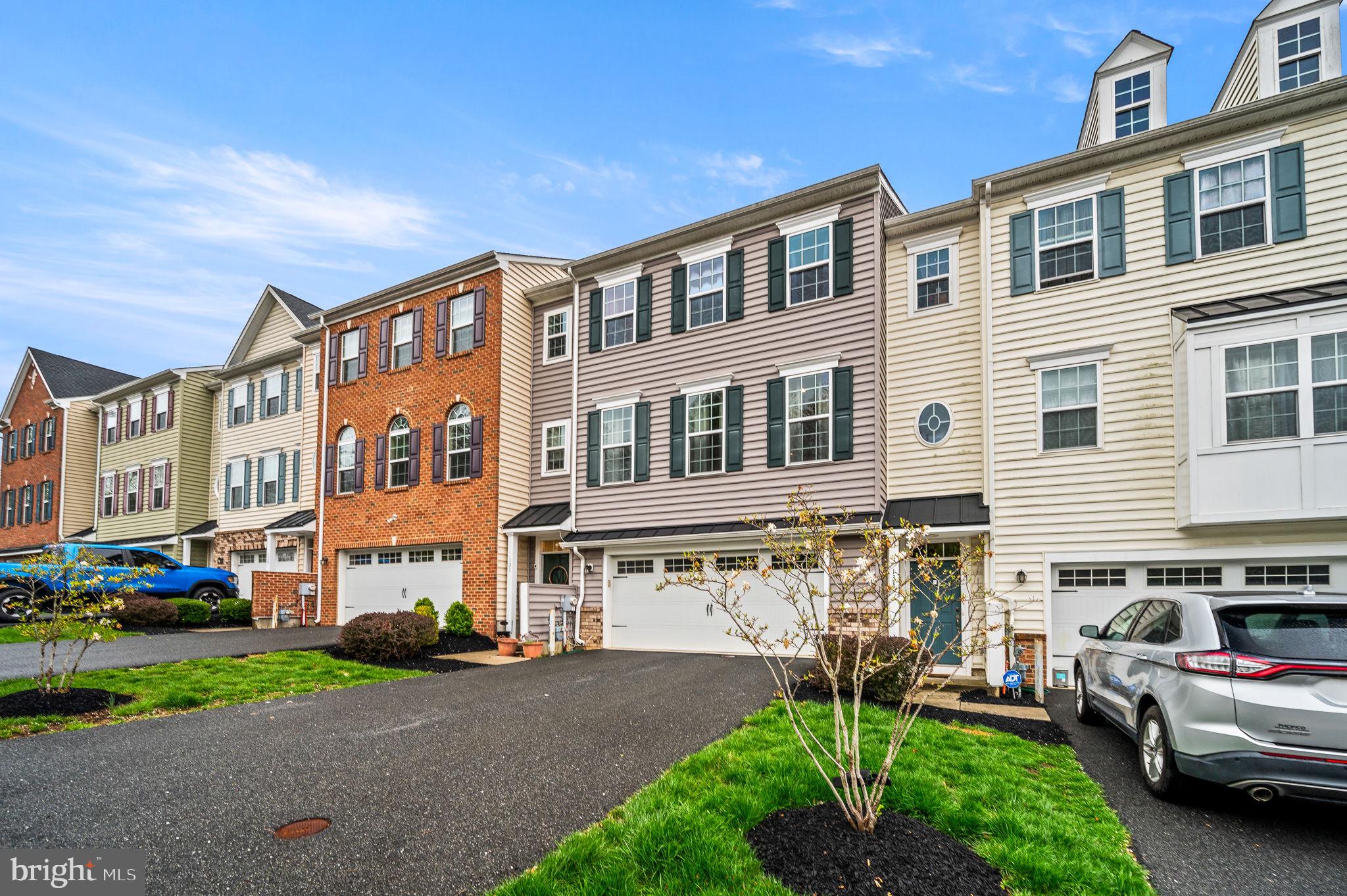 131 Time Circle Bear, DE 19701 - Photo 3 of 35 a view of a cars parked in front of a building