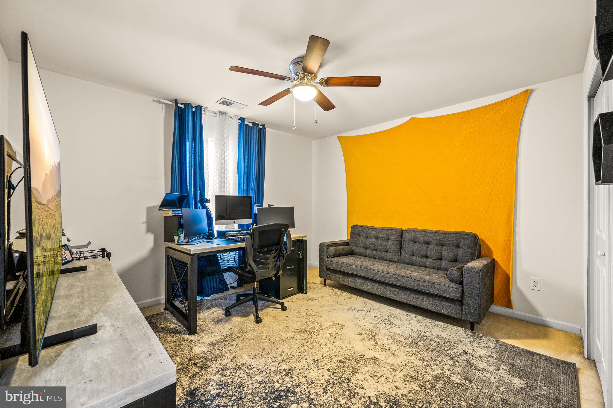 131 Time Circle Bear, DE 19701 - Photo 31 of 35 a view of a livingroom with workspace and a window