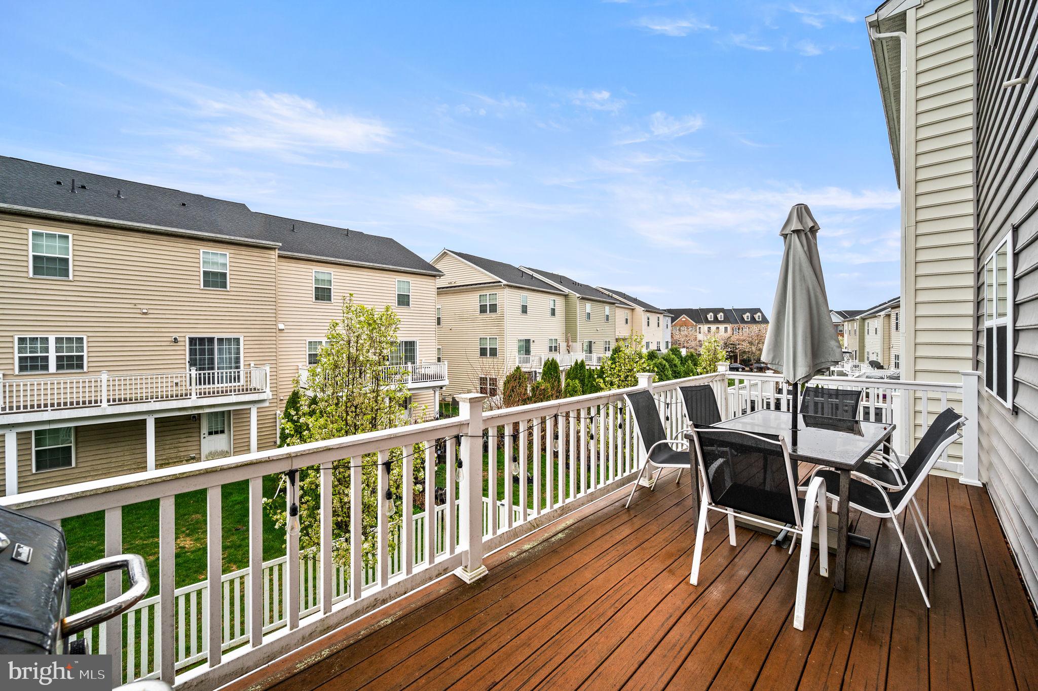 131 Time Circle Bear, DE 19701 - Photo 34 of 35 a view of a roof deck with table and chairs