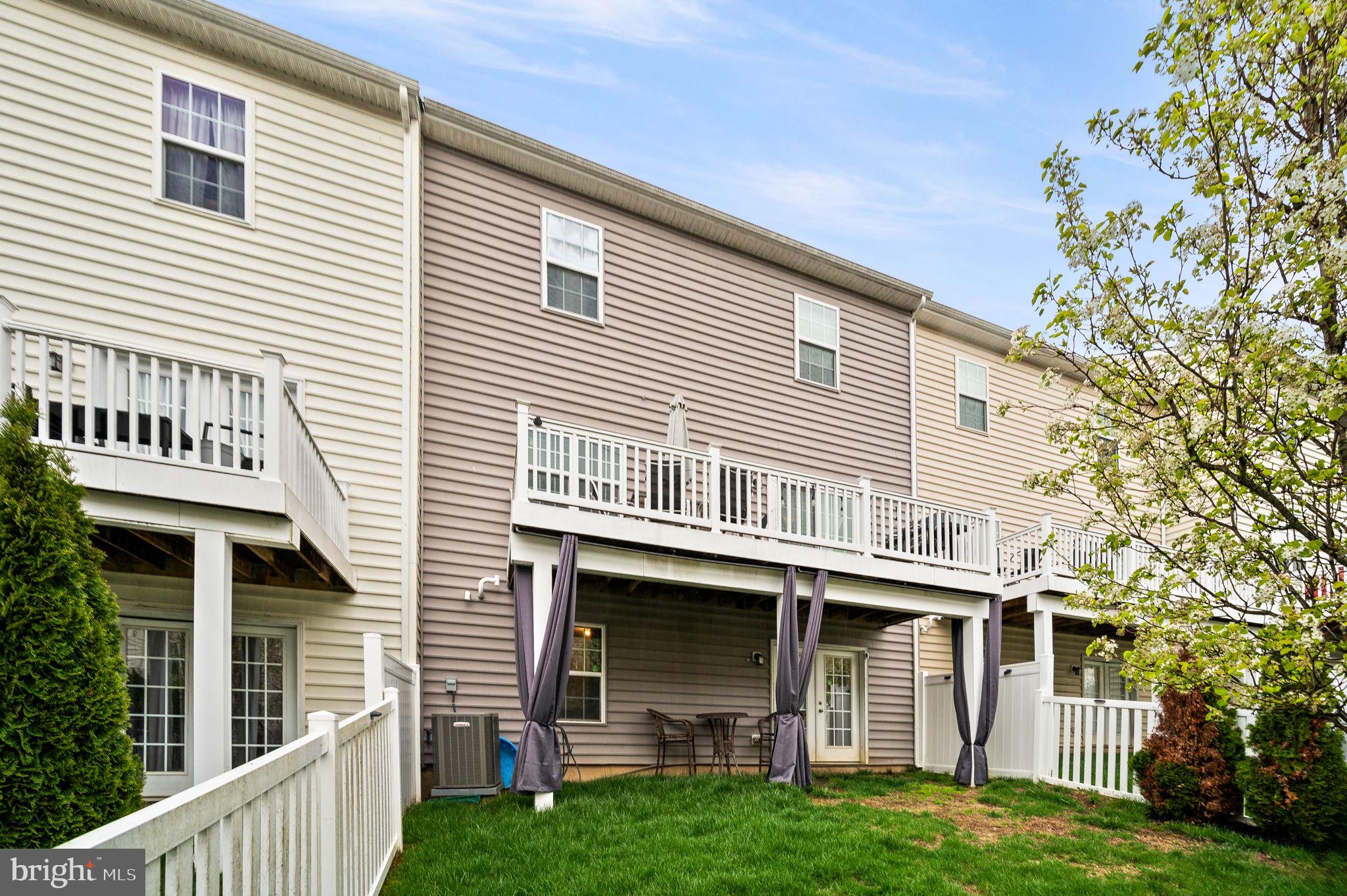 131 Time Circle Bear, DE 19701 - Photo 35 of 35 a front view of a house with a garden