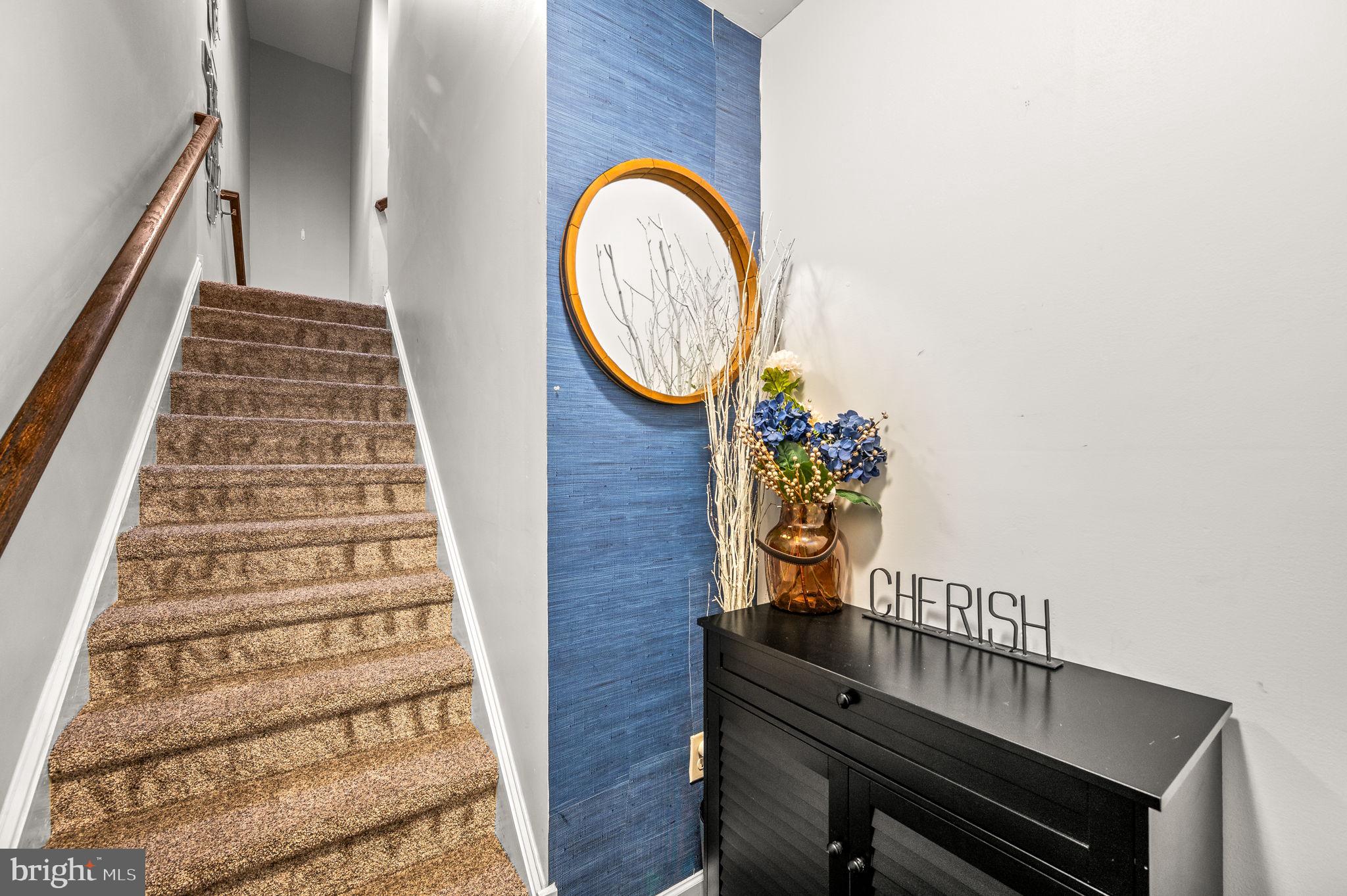 131 Time Circle Bear, DE 19701 - Photo 5 of 35 a view of staircase with wooden floor