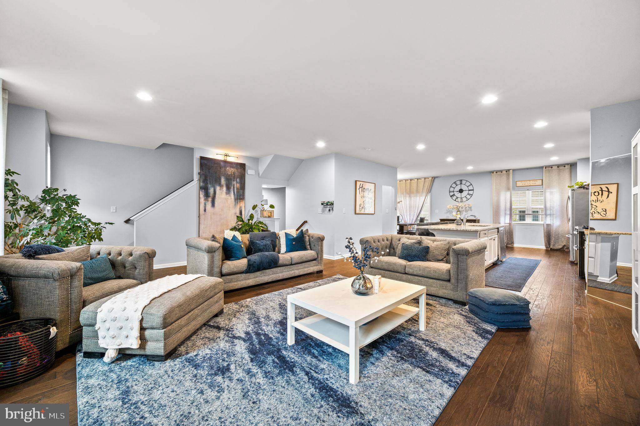131 Time Circle Bear, DE 19701 - Photo 9 of 35 a living room with furniture a rug and a table