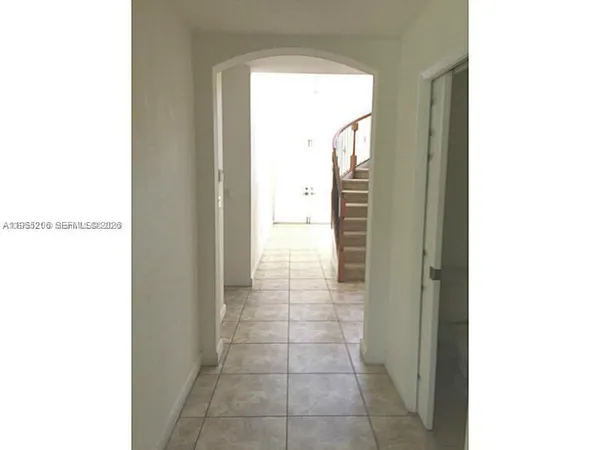 a view of a backyard of the house