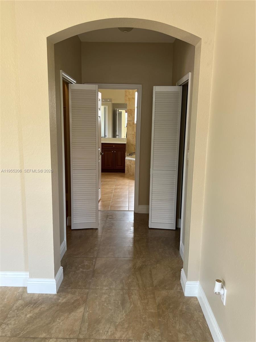 15389 Southwest 90th Terrace Miami, FL 33196 - Photo 43 of 67 MASTER BED ROOM FOYER
