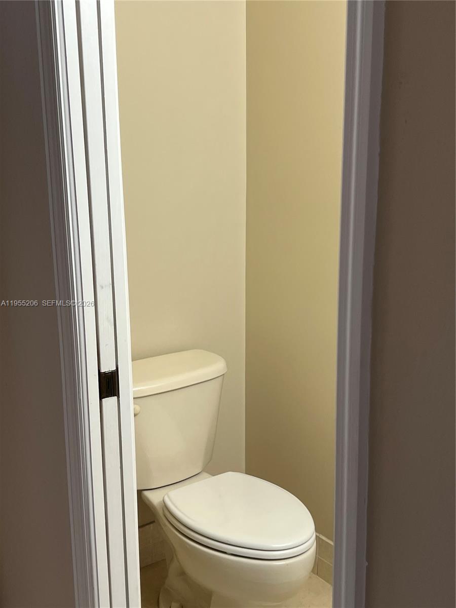 15389 Southwest 90th Terrace Miami, FL 33196 - Photo 58 of 67 POWDER ROOM TOILET