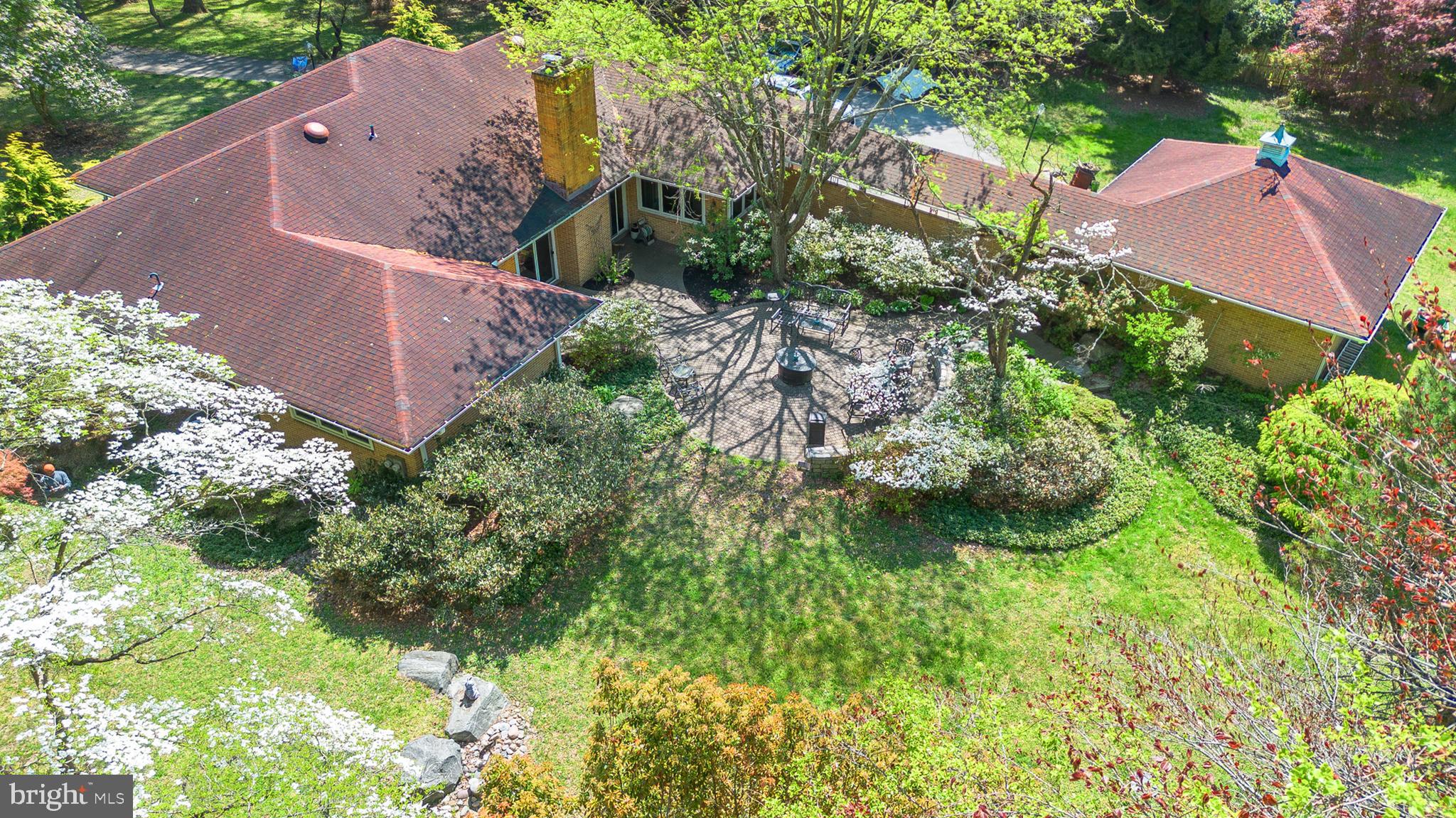 an aerial view of house with yard