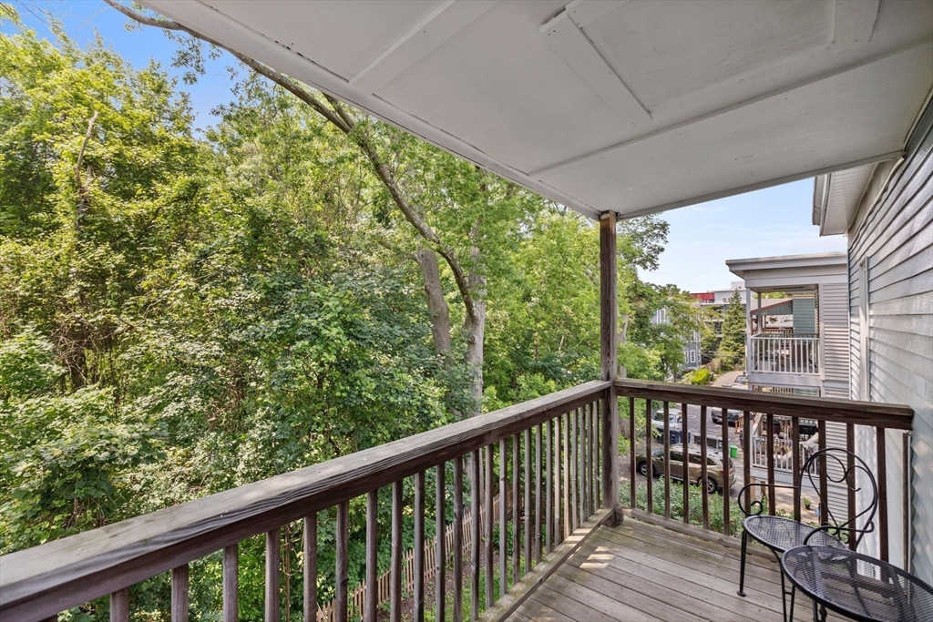 63-65 Brookley Road, Unit 3 Boston, MA 02130 - Photo 25 of 31 a view of a balcony with outdoor space