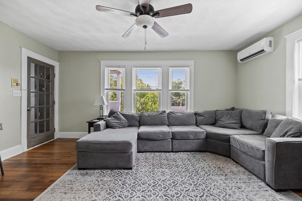 63-65 Brookley Road, Unit 3 Boston, MA 02130 - Photo 7 of 31 a living room with furniture and a window