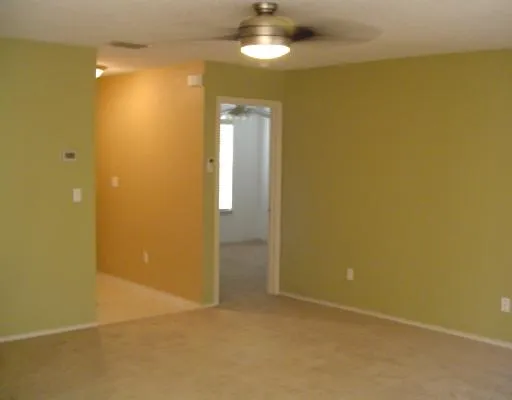 an empty room with a bathroom