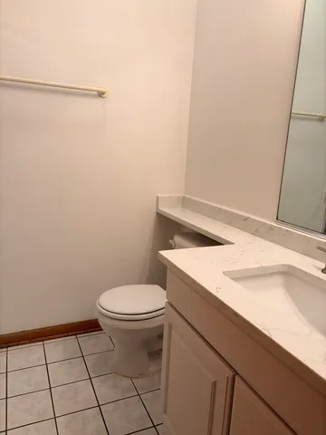 a bathroom with a sink and toilet