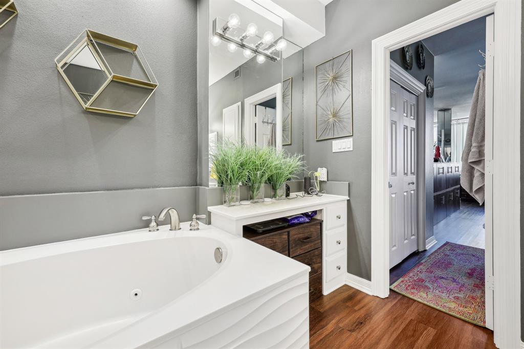 5200 Keller Springs Road, Unit 815 Dallas, TX 75248 - Photo 15 of 35 a bathroom with a sink and a mirror