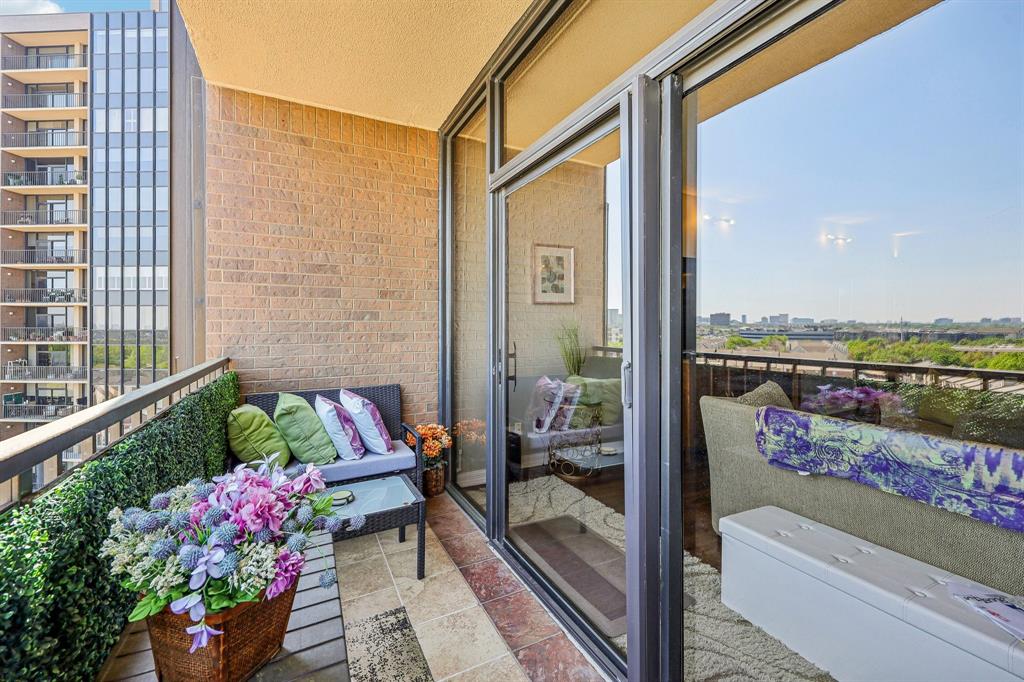 5200 Keller Springs Road, Unit 815 Dallas, TX 75248 - Photo 20 of 35 a balcony with furniture and garden view