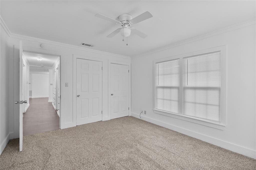 903 Lynn Street Bonham, TX 75418 - Photo 17 of 29 a view of an empty room with a window